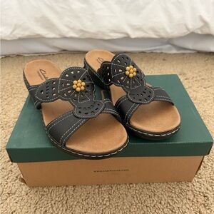 Clarks Black and Tan Sandals for Effortless Style